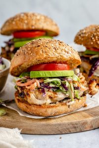Grilled Chicken Caesar Sandwiches with Tahini Slaw